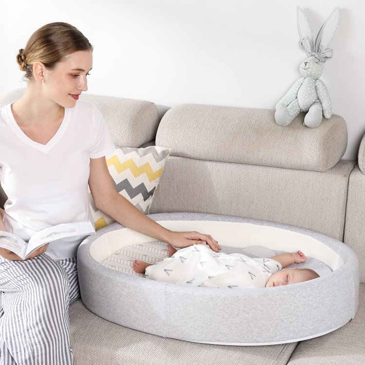 baby nest with swaddle belt